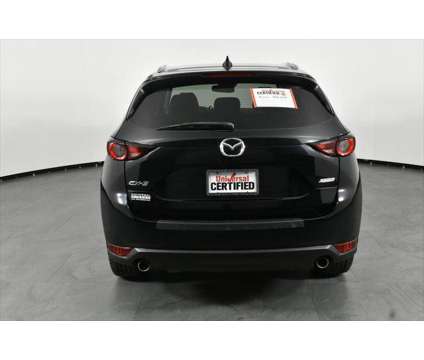 2018 Mazda CX-5 Touring is a Black 2018 Mazda CX-5 Touring SUV in Orlando FL