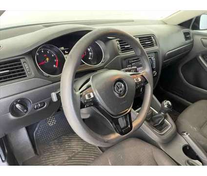 2015 Volkswagen Jetta 2.0L Base is a Grey 2015 Volkswagen Jetta 2.0L Base Sedan in Logan UT