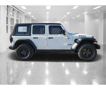 2024 Jeep Wrangler Willys 4xe is a White 2024 Jeep Wrangler Car for Sale in Orlando FL