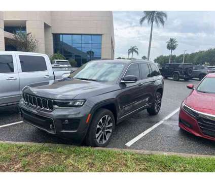 2022 Jeep Grand Cherokee Overland is a Grey 2022 Jeep grand cherokee Overland Car for Sale in Orlando FL