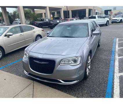 2016 Chrysler 300 Limited is a Silver 2016 Chrysler 300 Model Limited Car for Sale in Orlando FL