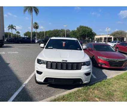 2021 Jeep Grand Cherokee Laredo X is a White 2021 Jeep grand cherokee Laredo Car for Sale in Orlando FL