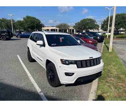 2021 Jeep Grand Cherokee Laredo X is a White 2021 Jeep grand cherokee Laredo Car for Sale in Orlando FL