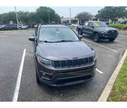 2021 Jeep Compass Altitude is a Grey 2021 Jeep Compass Altitude Car for Sale in Orlando FL