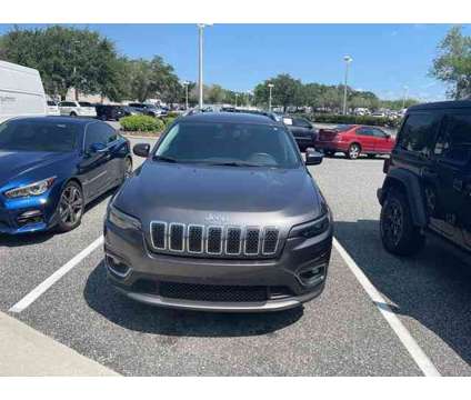 2019 Jeep Cherokee Limited is a Grey 2019 Jeep Cherokee Limited Car for Sale in Orlando FL