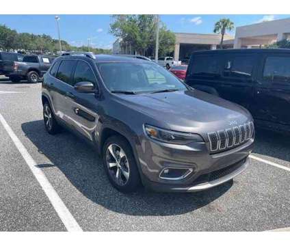 2019 Jeep Cherokee Limited is a Grey 2019 Jeep Cherokee Limited Car for Sale in Orlando FL
