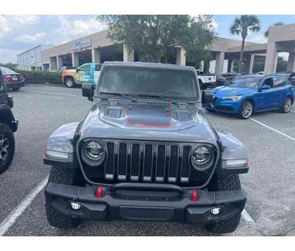 2020 Jeep Wrangler Unlimited Rubicon is a Grey 2020 Jeep Wrangler Unlimited Car for Sale in Orlando FL