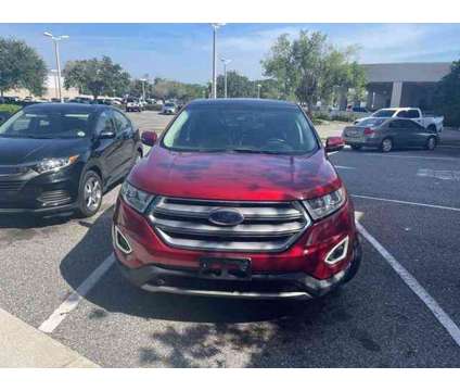 2016 Ford Edge SEL is a Red 2016 Ford Edge SEL Car for Sale in Orlando FL