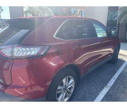 2016 Ford Edge SEL is a Red 2016 Ford Edge SEL Car for Sale in Orlando FL