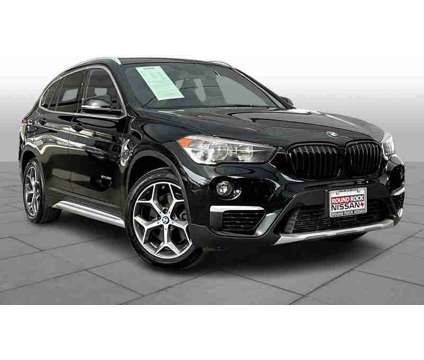 2018UsedBMWUsedX1 is a Black 2018 BMW X1 Car for Sale