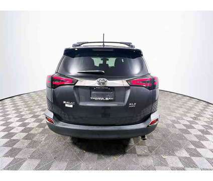 2014 Toyota RAV4 XLE is a Grey 2014 Toyota RAV4 XLE Car for Sale in Tampa FL