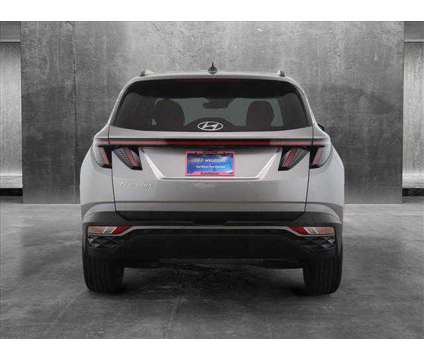 2023 Hyundai Tucson SEL is a Silver 2023 Hyundai Tucson SUV in Des Plaines IL