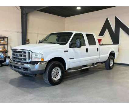 2002 Ford F350 Super Duty Crew Cab for sale is a White 2002 Ford F-350 Super Duty Car for Sale in Sacramento CA