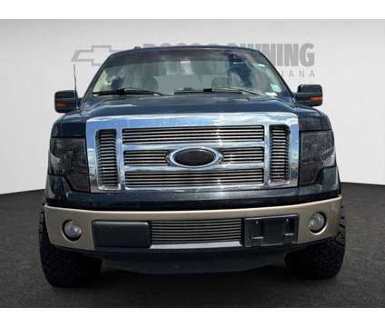 2011 Ford F-150 is a Black 2011 Ford F-150 Car for Sale in Hammond LA