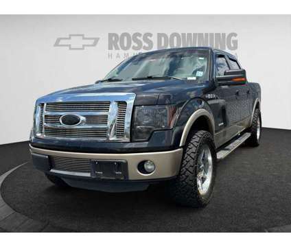 2011 Ford F-150 is a Black 2011 Ford F-150 Car for Sale in Hammond LA