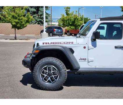 2024 Jeep Wrangler Rubicon is a White 2024 Jeep Wrangler Rubicon Car for Sale in Denver CO