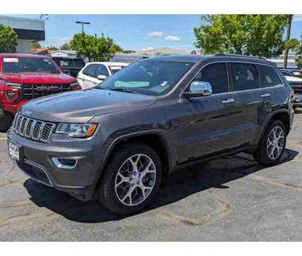 2020 Jeep Grand Cherokee Limited is a Grey 2020 Jeep grand cherokee Limited Car for Sale in Aurora CO