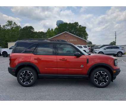 2024 Ford Bronco Sport Outer Banks is a Red 2024 Ford Bronco Car for Sale in Winder GA