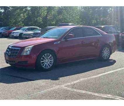 2010 Cadillac CTS Luxury is a Red 2010 Cadillac CTS Luxury Car for Sale in Howell MI