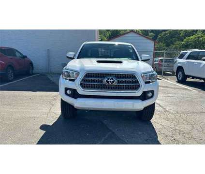 2017 Toyota Tacoma TRD Sport is a White 2017 Toyota Tacoma TRD Sport Truck in Akron OH