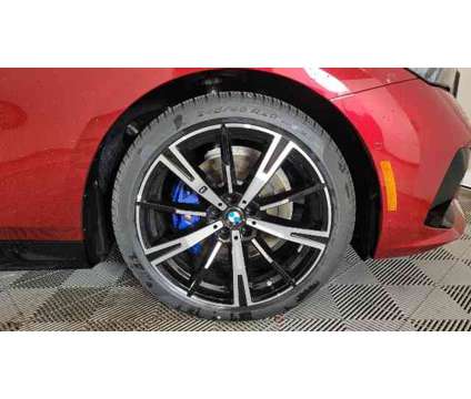 2024 BMW 5 Series 530i xDrive is a Red 2024 BMW 5-Series Sedan in Milwaukee WI
