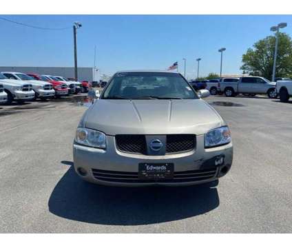 2005 Nissan Sentra 1.8 S is a Silver 2005 Nissan Sentra 1.8 S Sedan in Council Bluffs IA
