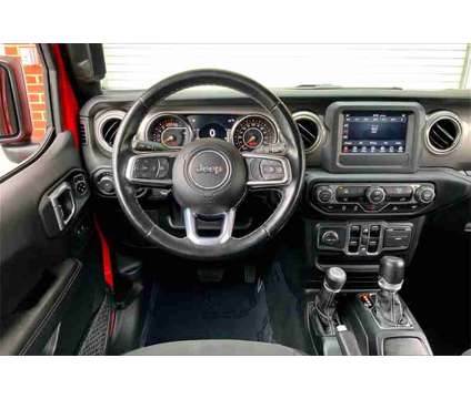 2021 Jeep Wrangler Unlimited Sahara is a Red 2021 Jeep Wrangler Unlimited Sahara SUV in Fredericksburg VA