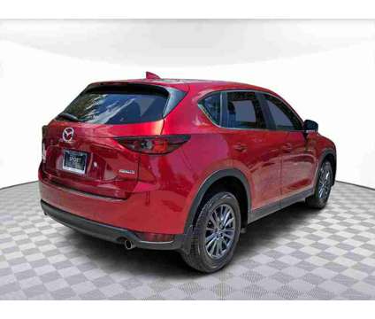 2021 Mazda CX-5 Touring is a Red 2021 Mazda CX-5 Touring SUV in Orlando FL
