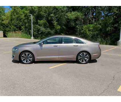 2018 Lincoln MKZ Hybrid Reserve is a Brown 2018 Lincoln MKZ Hybrid Reserve Hybrid in New Hudson MI