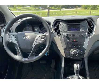 2017 Hyundai Santa Fe Sport 2.4L is a Black 2017 Hyundai Santa Fe Sport 2.4L SUV in Anderson SC
