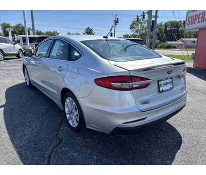 2019 Ford Fusion Energi Titanium is a Silver 2019 Ford Fusion Energi Titanium Sedan in Dubuque IA
