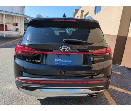 2023 Hyundai Santa Fe SEL is a Black 2023 Hyundai Santa Fe SUV in Ocala FL