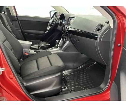 2015 Mazda CX-5 Touring is a Red 2015 Mazda CX-5 Touring SUV in Logan UT