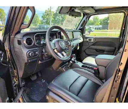 2024 Jeep Wrangler 4xe Sahara 4xe is a Black 2024 Jeep Wrangler SUV in Freehold NJ