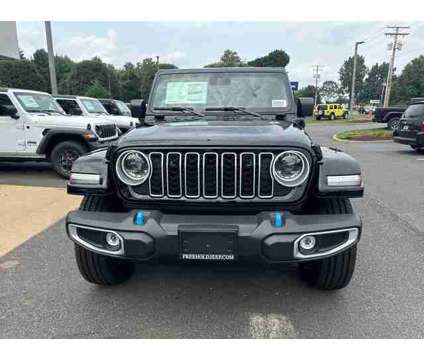 2024 Jeep Wrangler 4xe Sahara 4xe is a Black 2024 Jeep Wrangler SUV in Freehold NJ