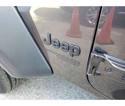 2021 Jeep Wrangler Sport S 4X4 is a Grey 2021 Jeep Wrangler Sport SUV in Orlando FL
