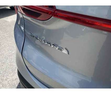 2023 Hyundai Santa Fe SEL is a Silver 2023 Hyundai Santa Fe SUV in Orlando FL