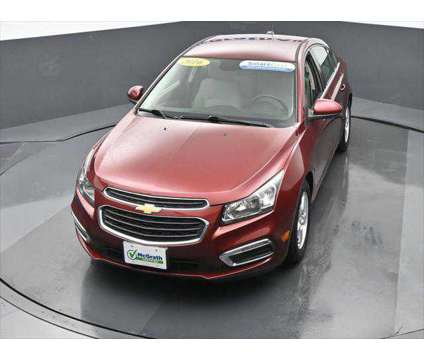 2016 Chevrolet Cruze Limited 1LT Auto is a Red 2016 Chevrolet Cruze Limited 1LT Sedan in Dubuque IA