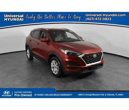 2021 Hyundai Tucson Value is a Red 2021 Hyundai Tucson Value SUV in Orlando FL