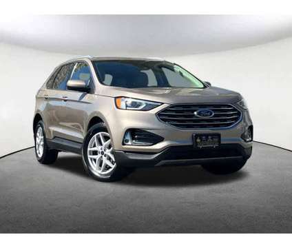 2021UsedFordUsedEdge is a Gold 2021 Ford Edge SEL Car for Sale in Mendon MA