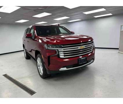 2024NewChevroletNewTahoe is a Red 2024 Chevrolet Tahoe 1500 2dr Car for Sale in Clinton IL