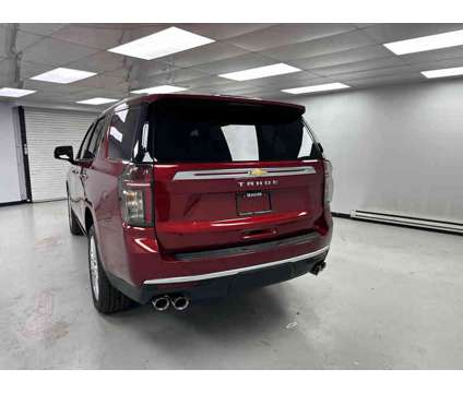 2024NewChevroletNewTahoe is a Red 2024 Chevrolet Tahoe 1500 2dr Car for Sale in Clinton IL