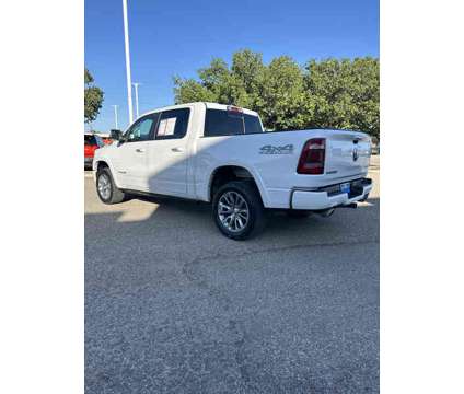 2021UsedRamUsed1500 is a White 2021 RAM 1500 Model Car for Sale in Pampa TX
