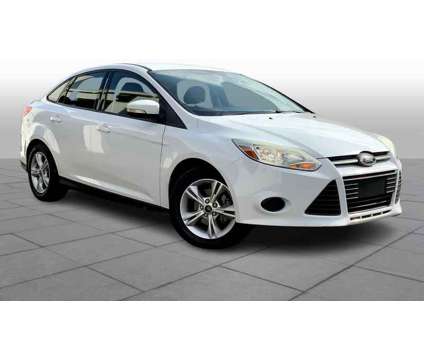2014UsedFordUsedFocus is a White 2014 Ford Focus Hatchback in Overland Park KS