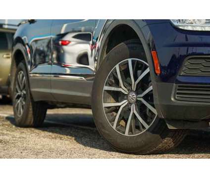 2021 Volkswagen Tiguan 2.0T SE is a Blue 2021 Volkswagen Tiguan 2.0T Car for Sale in San Antonio TX