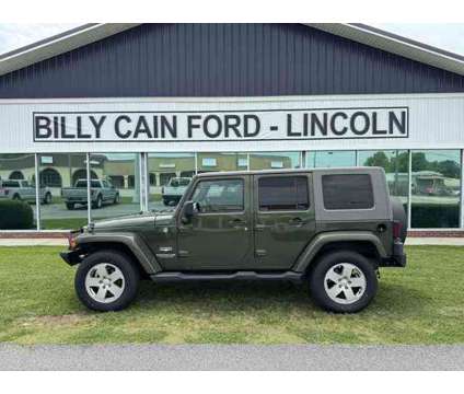 2007 Jeep Wrangler Unlimited Sahara is a Green 2007 Jeep Wrangler Unlimited Car for Sale in Cornelia GA