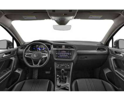 2024 Volkswagen Tiguan SE is a Black 2024 Volkswagen Tiguan SE Car for Sale in Glenview IL