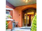 Spacious 2 bedroom condo with high ceilings, beautiful original woodwork from