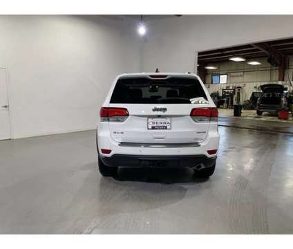 2021 Jeep Grand Cherokee Limited is a White 2021 Jeep grand cherokee Limited Car for Sale in Traverse City MI