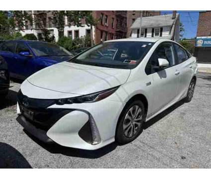 2021 Toyota Prius Prime XLE is a White 2021 Toyota Prius Prime Hatchback in Bayside NY